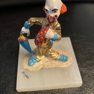 Colorful Clown Figurine with Umbrella